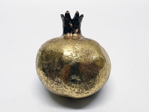 Gold coloured decorative half - gold,